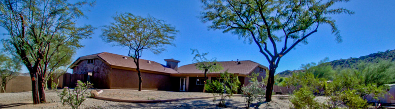 Old World charm w/ arches, spacious hallways, solid rough hewned beams, natural Italian stone throughout & hardwood floors.