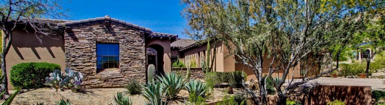 Old World charm w/ arches, spacious hallways, solid rough hewned beams, natural Italian stone throughout & hardwood floors.